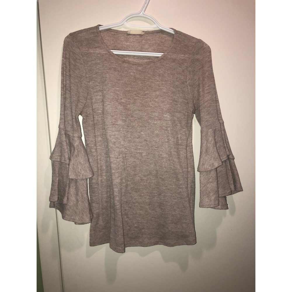 Tan/light pink shirt.